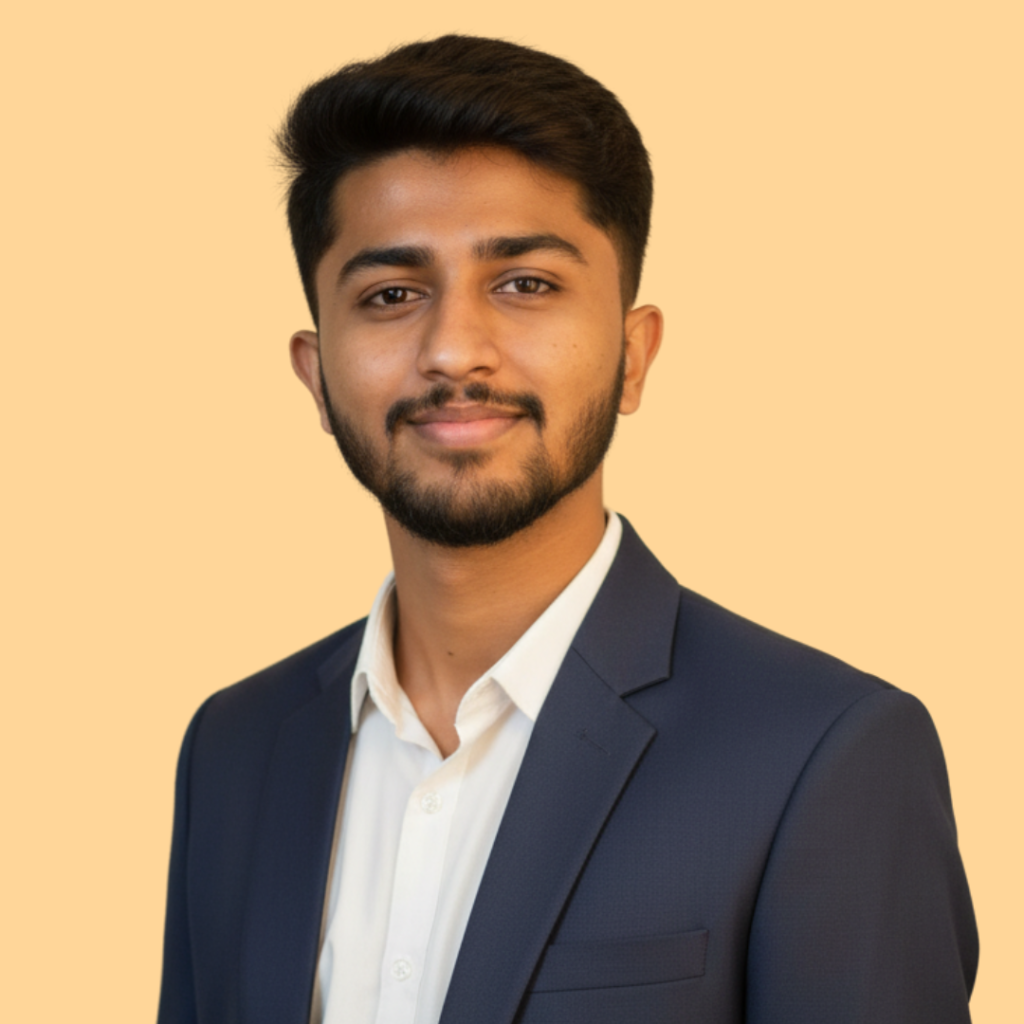 E. Yogesh, Co-Founder and Managing Director of Stakrew, smiling in a professional corporate portrait.