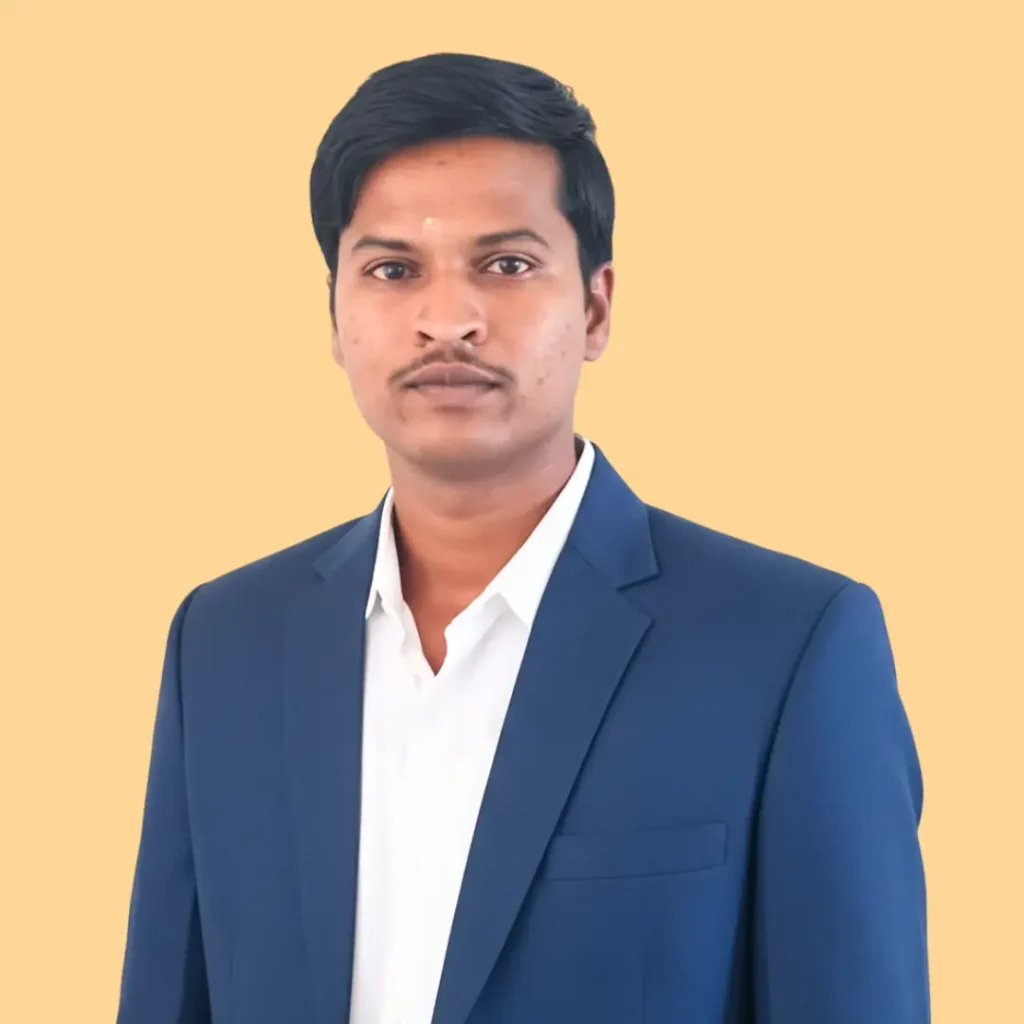 Professional portrait of P. Sathish, Founder and CEO of Stakrew, wearing business attire against a neutral background.